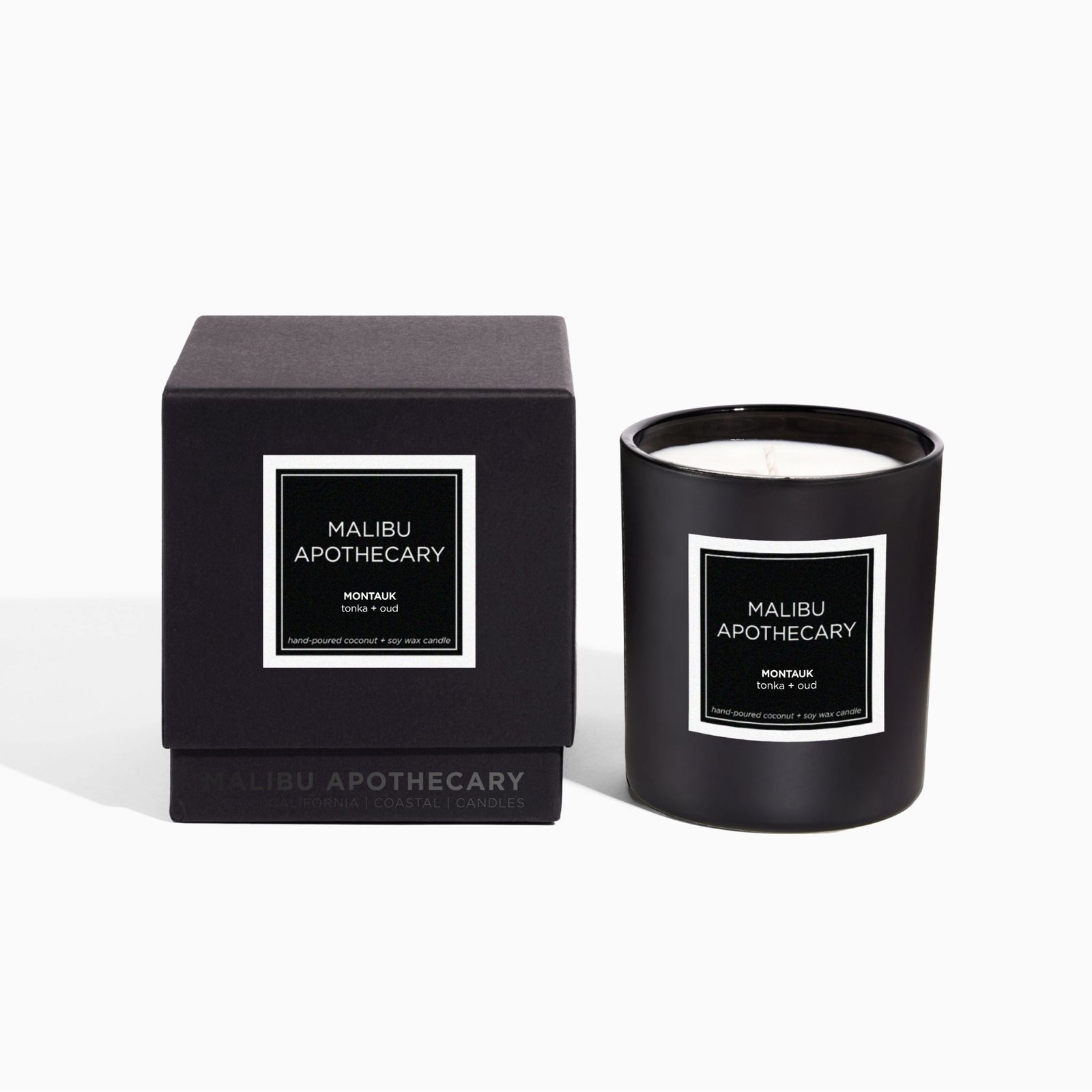 Malibu Apothecary Montauk candle in a matte black jar with coconut-soy wax and warm coastal wood fragrance inspired by the Hamptons.